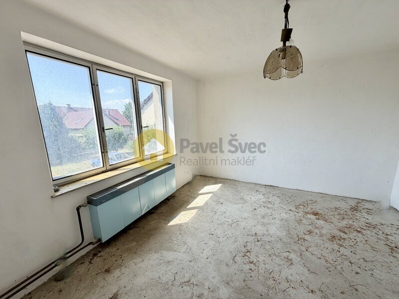 Stavba rodinného domu s pozemky 1.119 m2 - Radomyšl, okr. Strakonice